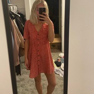 Red, white floral, scrunch shoulders optional, v-neck, button up, sun dress.